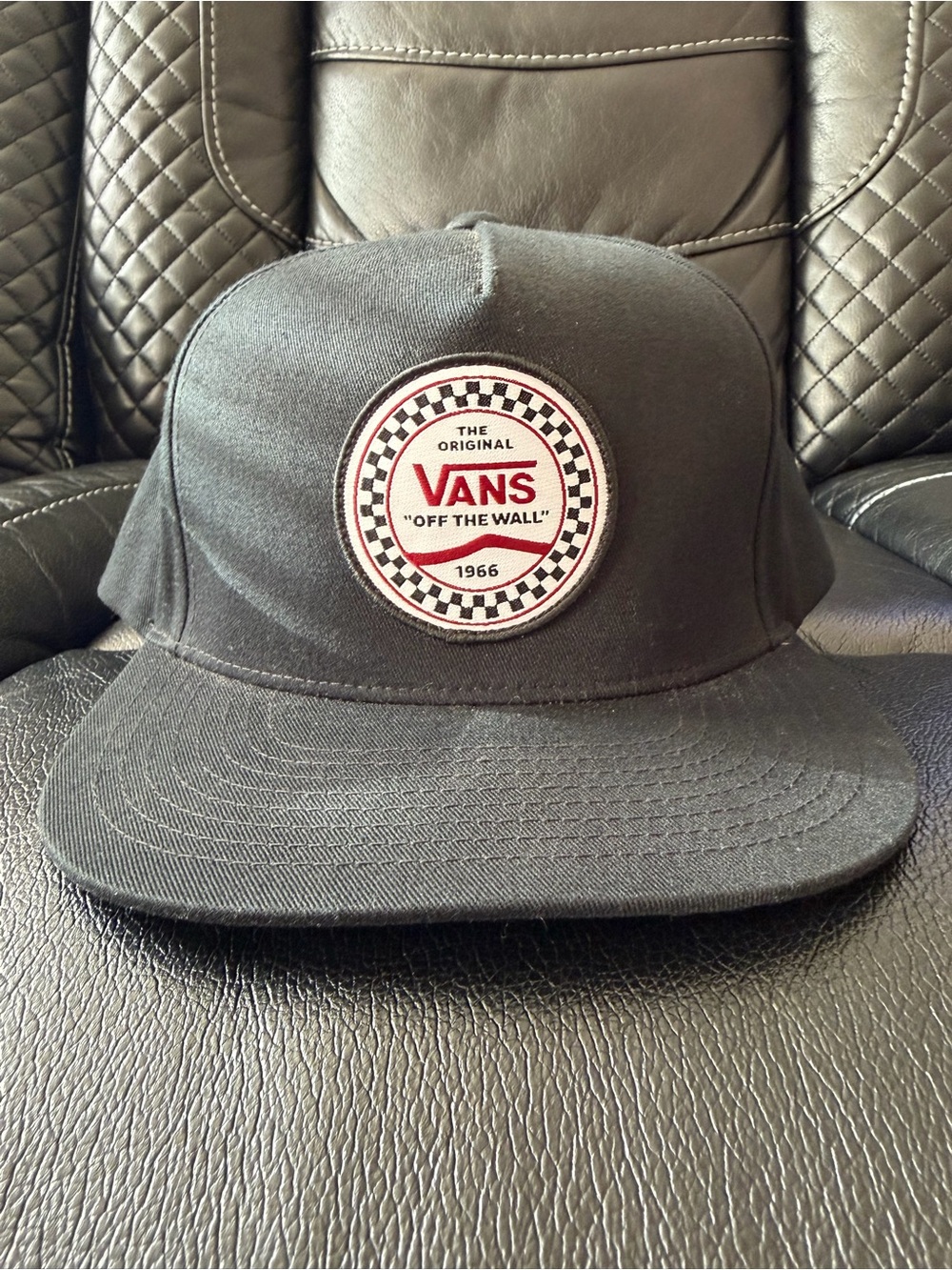 Vans Black Snapback Hat with Red & White Logo Patch
